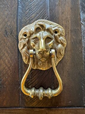 Vintage brass lion head door knocker